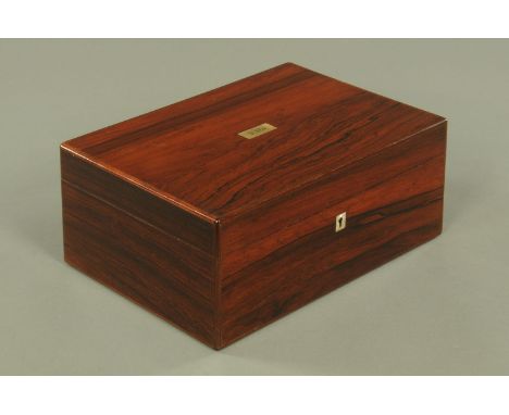 A Victorian rosewood veneered sewing box, of rectangular form, the lid with inset mother of pearl medallion inscribed A Shaw,