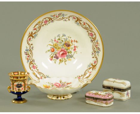 A Royal Worcester porcelain bowl, two patch boxes, Royal Crown Derby miniature urn and pin dish.  Largest diameter 22 cm. 