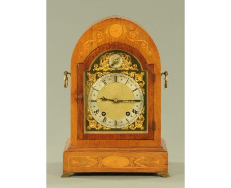 An Edwardian rosewood cased mantle clock, inlaid and with silvered brass dial, with two-train Winterhalder & Hofmeier movemen