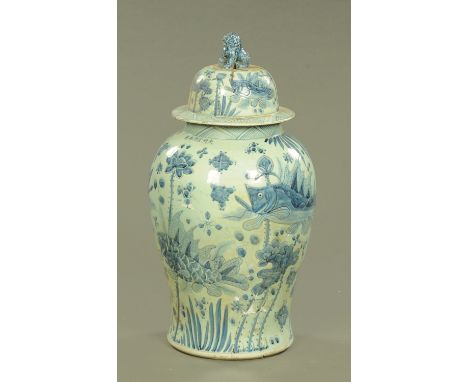 A Chinese blue and white baluster vase and cover, 20th century, the domed cover with Dog of Fo finial and decorated throughou