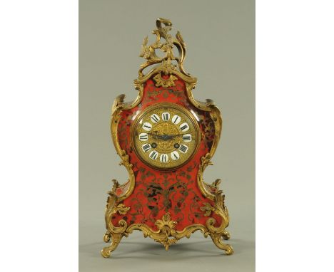 A 19th century boulle marquetry mantle clock, with two-train striking movement.  Height 40 cm, width 22 cm.  CONDITION REPORT