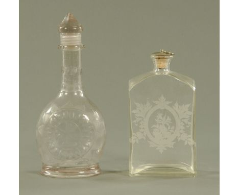 An antique screw top flask type decanter, and another foliate engraved.  Tallest 24 cm. CONDITION REPORT: The square flask is