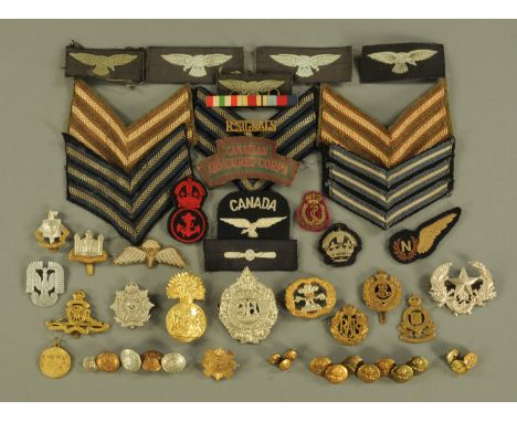 Militaria - a collection of cap badges, sew on arm insignia, sergeant stripes and buttons to include regiments Argyll and Sut