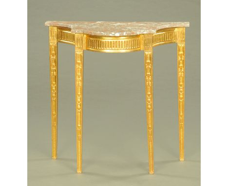 An Adam style console table, with variegated marble top, the frieze being knulled and raised on tapered legs of square sectio