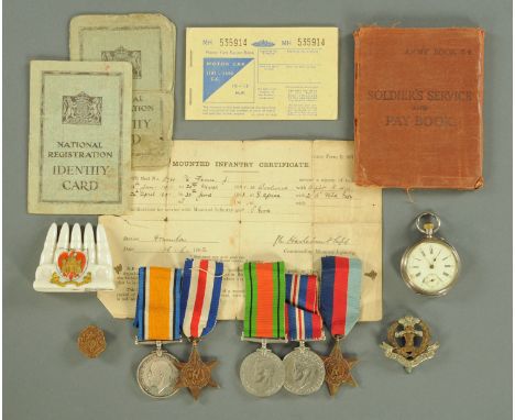 Militaria - a George V war medal, awarded to 275270 Pte. J.V. Fenn. Som.L.I. with a group of Second World War medals to inclu