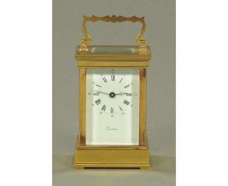 A French brass cased "Eurotime" carriage clock timepiece, the enamel dial with Roman and Arabic numerals.  Height excluding h