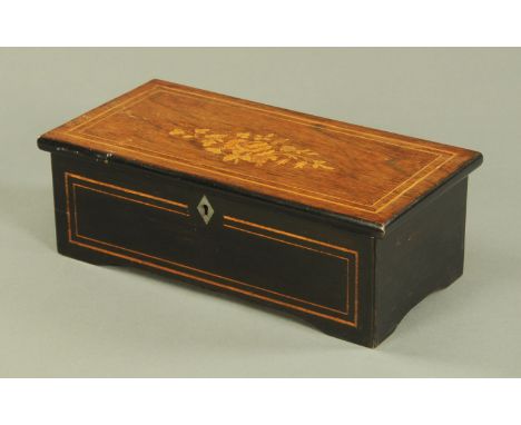 A 19th century rosewood floral marquetry cased music box, with 15 cm comb, case dimensions 34 cm x 60.5 cm x 11.5 cm (see ill