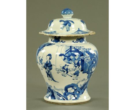 A Chinese blue and white "Hundred boys" baluster vase and cover, Kangxi period (1662-1722), decorated with boys in playful pu