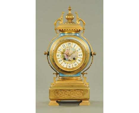 A 19th century French mantle clock, gilt brass and porcelain, with two-train striking movement.  Height 40 cm, width 21 cm. 