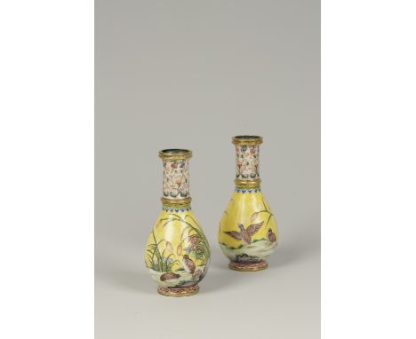 A PAIR OF CHINESE MINIATURE ENAMEL VASES, decorated with birds against a yellow ground, 9cm high (2)