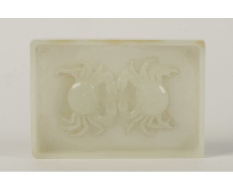 A CHINESE PALE CELADON JADE "TWO CRABS" DISH, Qing Dynasty, 18th/19th century, carved in relief with two confronting crabs, t