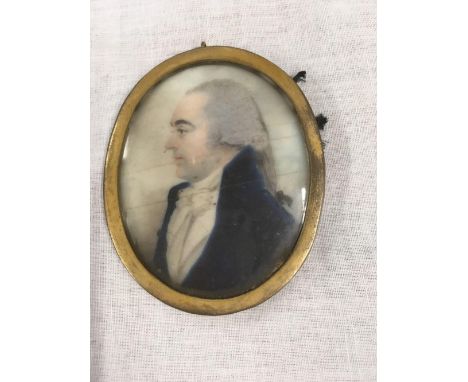 18THC MINIATURE PORTRAIT OF A BE-WIGGED GEORGIAN GENTLEMAN IN A BLUE VELVET JACKET