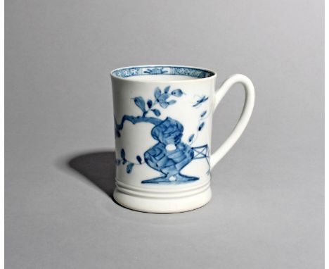 An early and rare Worcester blue and white small mug, c.1754-55, the cylindrical form painted with the Warbler pattern, a sin