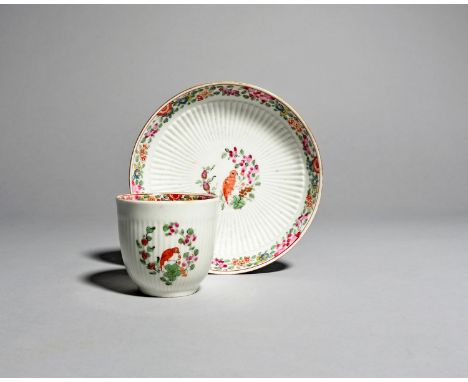 A Worcester coffee cup and a saucer, c.1765, moulded with a continuous band of reeding and painted with the Old Worcester Par