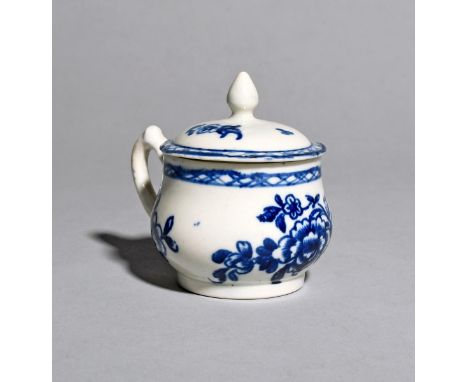 A rare Seth Pennington (Liverpool) blue and white custard cup and cover, c.1778-90, the squat rounded form decorated with a s