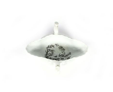 A Worcester two-handled sauceboat, c.1755, the exterior printed in black with four vignettes of Men of War ships within mould