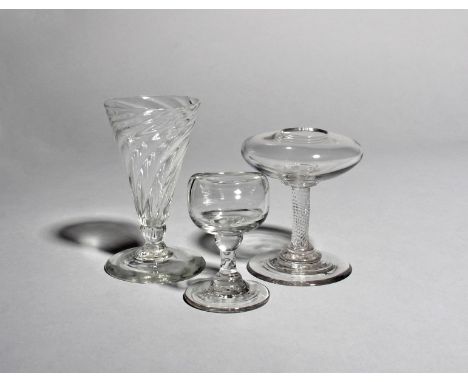 A dwarf ale glass, c.1770, with a flared wrythen moulded bowl raised on a short knopped stem and conical foot, a lace-maker's