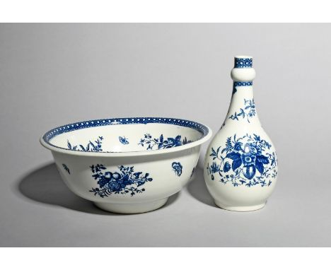 A Worcester blue and white water bottle or guglet and basin, c.1760-65, each printed with the Pinecone pattern within a honey