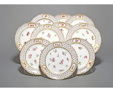 Ten Sèvres plates (assiettes), c.1770-76, decorated with a form roses et mosaïque pattern, with scattered pink roses, the bor