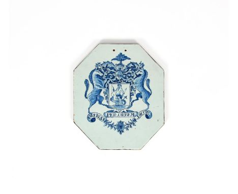 A London delftware apothecary or pill slab, c.1785, possibly Mortlake, the elongated octagonal form painted in blue with the 