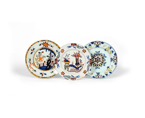 A delftware plate, c.1785-95, of 'Ann Gomm' type, painted with a manganese hexagon motif within stylized polychrome flowers, 