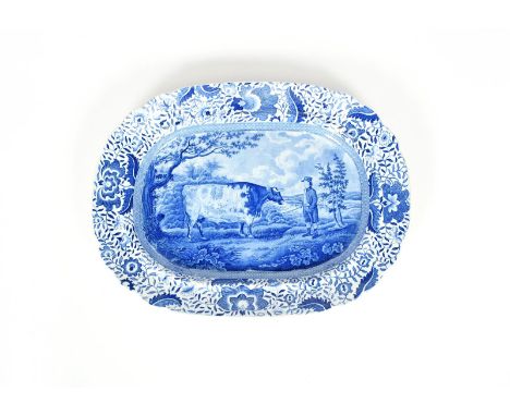 A blue and white transferware Durham Ox charger, 1st half 19th century, printed with the eponymous bull standing beside his o