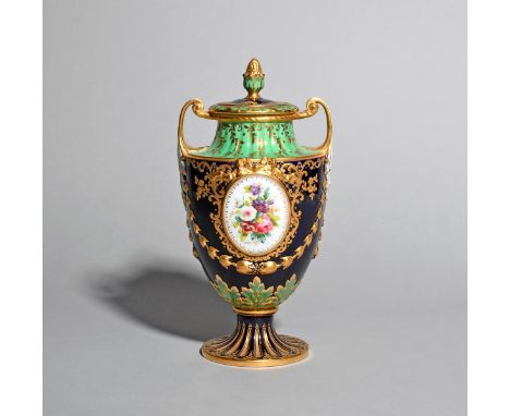 A Spode Copeland vase and cover, c.1900, painted to two sides with an oval panel of flowers within a moulded and gilded ribbo