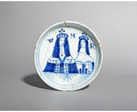 A London delftware Royal dish, c.1690, painted in blue with a double head and shoulders portrait of William and Mary, each cr