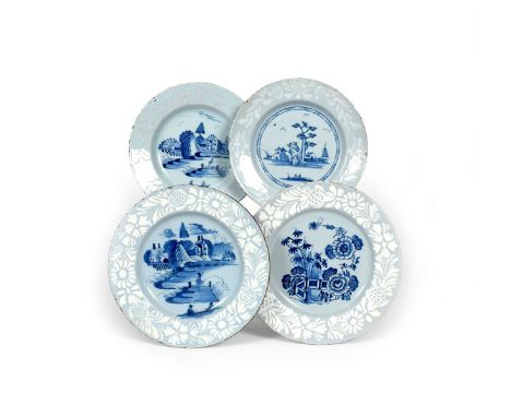 Four Bristol delftware plates, c.1760-70, two painted with figures in boats and fishing before buildings and a tall tree, ano