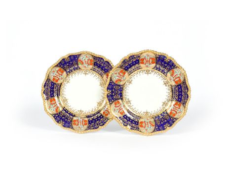 A pair of Flight Barr and Barr (Worcester) plates, c.1820-30, brightly painted with six panels of stylized Kakiemon flowers r