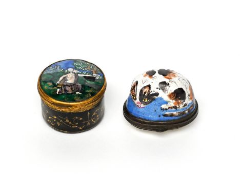 An English enamel bonbonnière, c.1770, modelled as a cat recumbent on a blue cushion, its coat decorated with patches of brow