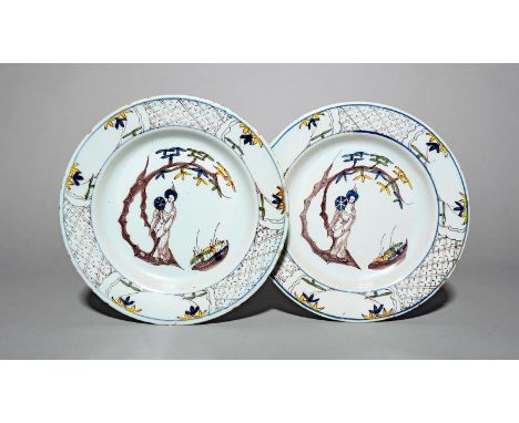 A pair of Lambeth delftware plates, c.1750-60, each painted with a Chinese lady holding a fan and standing beneath curved bra