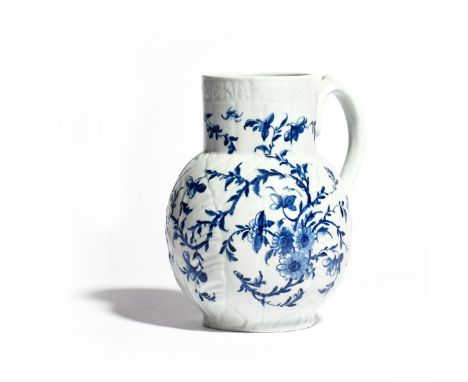 A Worcester blue and white Dutch jug, c.1758, the rounded body formed of overlapping cabbage leaves, boldly painted with cont