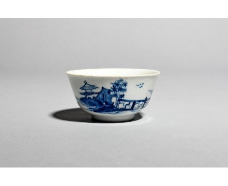A rare and early Worcester blue and white teabowl, c.1753-54, painted with the Crescent Moon pattern, with a long ornamental 