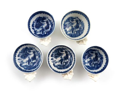 Five Worcester and Caughley blue and white wine tasters, c.1760-80, of varying circular form, printed to the interiors with t