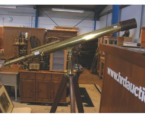 An antique Ross of London brass telescope on tripod stand - 5cm diameter lens and measuring 105cm in length 