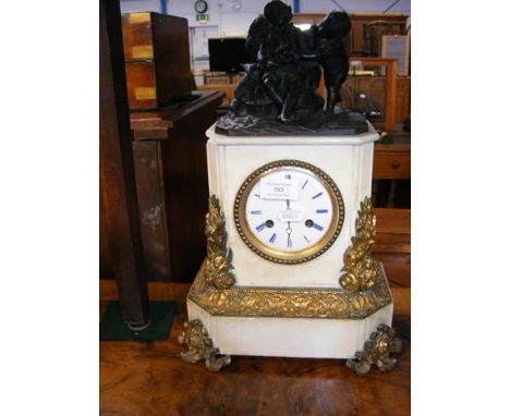 French mantel clock with figural mount - 40cm high 