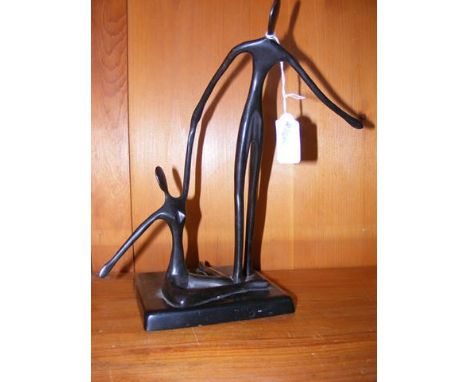 Unusual bronze of stick man and woman 