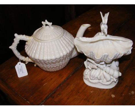 A Belleek teapot, together with a Belleek shell ornament CONDITION REPORTv small chip to rim of shell edge - nothing major