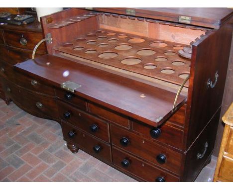 An unusual Victorian campaign chest - the top with hinged drawer front and fitted drinks cabinet interior (split into two) wi