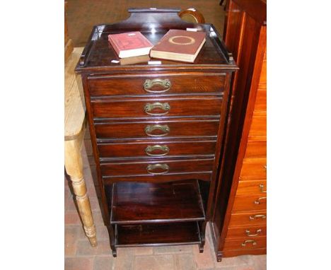 An Edwardian five drawer music cabinet 