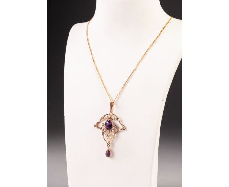 9ct GOLD ART NOUVEAU OPENWORK BROOCH, set with seed pearls, centre oval amethyst and small pendant tear shaped amethyst (one 