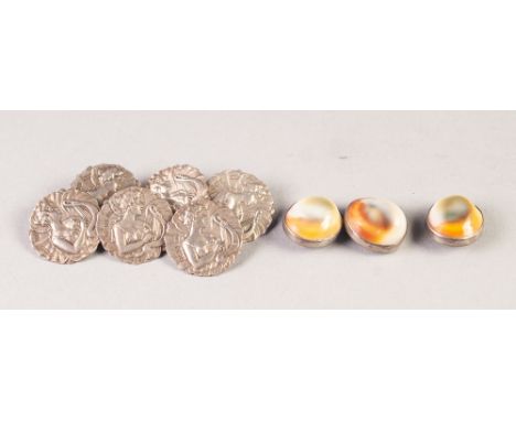 A SET OF SIX EDWARDIAN ART NOUVEAU EMBOSSED SILVER BUTTONS, featuring a Grecian maiden playing a harp, 7/8" (2.2cm) diameter,