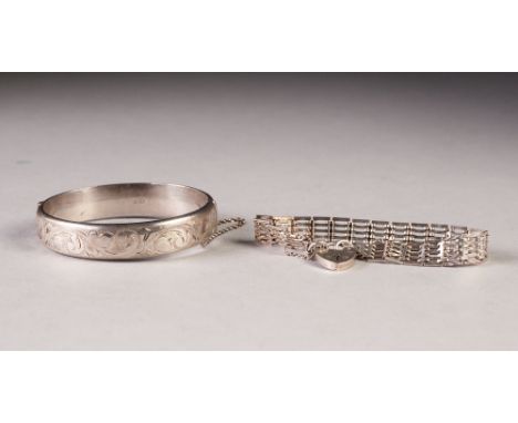 SILVER HINGE OPENING BANGLE, with foliate scroll engraved top, Birmingham 1978 and a SILVER GATE PATTERN BRACELET with padloc