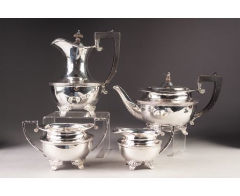 GEORGE V FOUR PIECE HEAVY QUALITY SILVER TEA SET BY WILLIAM HUTTON &amp; SONS Ltd, of circular form with black angular scroll