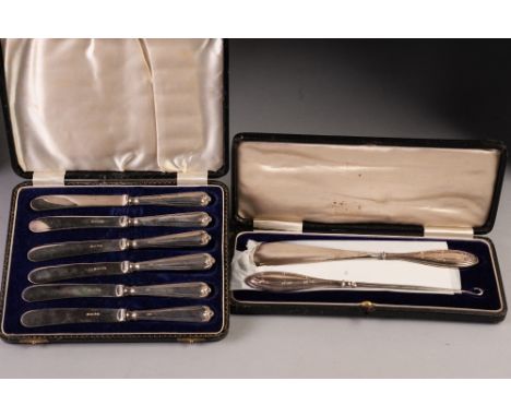 SET OF SIX AFTERNOON TEA KNIVES with silver handles, in case, Sheffield 1931 and  A SHOE HORN AND MATCHING BUTTON HOOK, with 