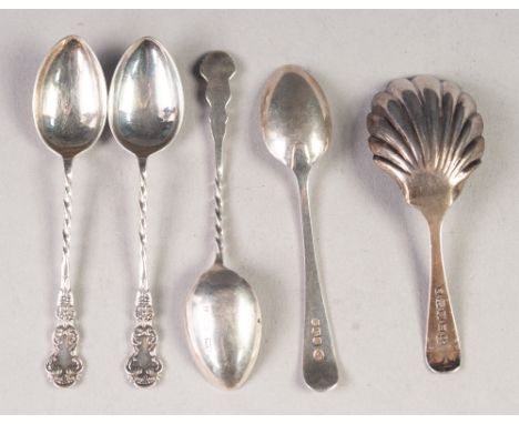 VICTORIAN SILVER CADDY SPOON, with fluted scallop shell shaped bowl, Exeter 1858; SET OF THREE VICTORIAN SILVER TEASPOONS, th