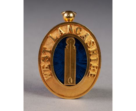 EARLY TWENTIETH CENTURY WEST LANCASHIRE LODGE 9ct GOLD AND BLUE ENAMEL OVAL PENDANT JEWEL, the centre featuring a plumb line 