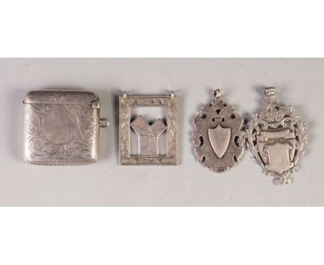 SILVER VESTA CASE,  curbed oblong and foliate scroll engraved Chester 1921; Victorian silver wood shield MEDALLION, Birmingha