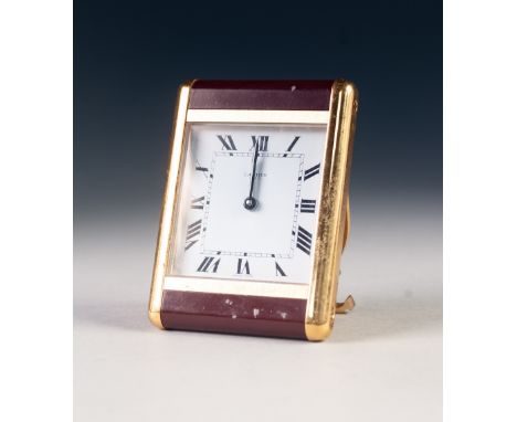 CARTIER, CIRCA 1980's GITL METAL AND MAROON ENAMEL BEDSIDE OR TRAVEL CLOCK, with quartz movement, square dial with Roman nume